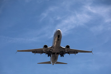 Airplane during landing approach at the airport