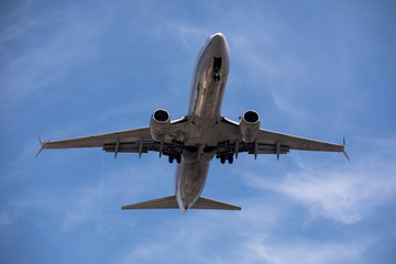 Airplane during landing approach at the airport