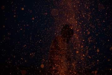 Fototapeta na wymiar Outdoor fire against a night dard background