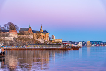 Sunset view of the Akershus fort in Oslo, Norway