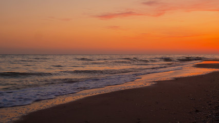 Fototapeta na wymiar Sunrise over the sea morning beach