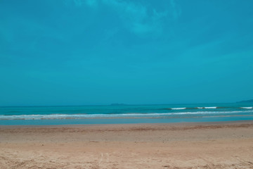 Fototapeta na wymiar Green ocean shore and beach in Hainan island, China.