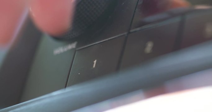 Selecting a radio preset and turning up the volume