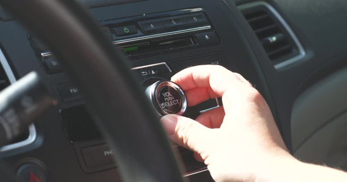Adjusting the volume on a car radio
