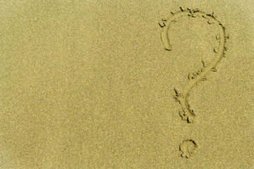 Question mark on the sand