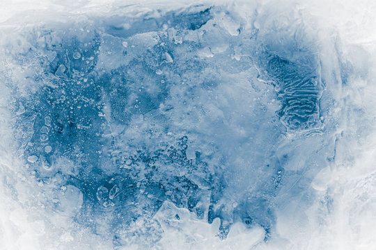 Textured ice block surface background.