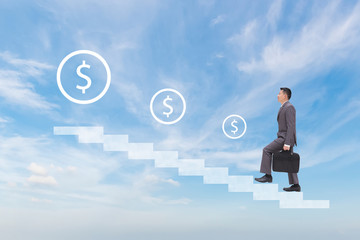 Business man stepping up stairs to reach his goal with dollar sign in destination.Professional leader move forward with ambition and confidence.Business work successful concept