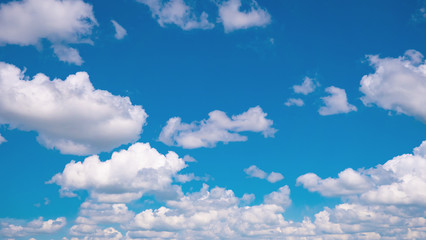Naklejka na ściany i meble Blue sky with clouds in summer sunny day