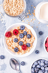 Breakfast, oatmeal with berries.