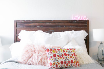 Modern Bed with Decorative Pillows and Neon Sign, Cute girl bedroom, trendy home decor