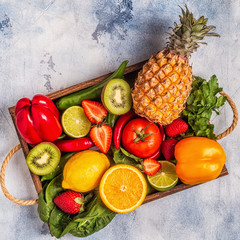 Fruits and vegetables rich in vitamin C in box.