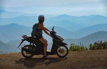 Fototapeta na wymiar Tourist in Thailand on a Motorcycle