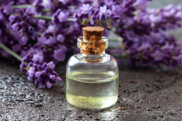 Obraz na płótnie Canvas A bottle of lavender essential oil
