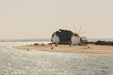 Alburrica windmills, estuary river windmills, landscape, Portugal