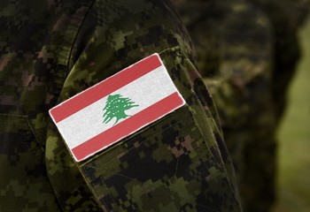 Flag of Lebanon on soldiers arm (collage).