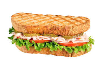 handmade tasty turkey sandwich with tomato, salad and cucumber, isolated on white