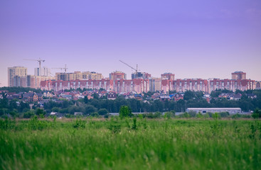 Panoramic view of the city buildings: high-rise buildings and low-rise buildings