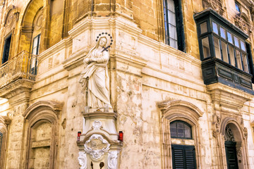 Sculpture of the Virgin Mary on the Corner in Senglea in Malta