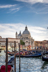 Obraz na płótnie Canvas Basilique Santa Maria della Salute gondole canal in Venice, Italy
