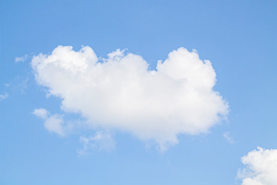 white clouds against the blue sky. © Александр Могилевцев