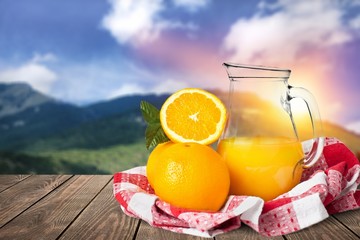 Orange juice and slices of orange on background © BillionPhotos.com