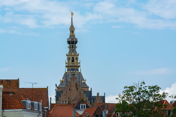 View on old Dutch houses and church tower in Zierikzee, historical town in Zeeland, Netherlands