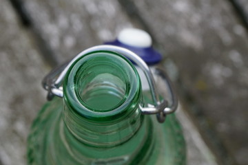 Bottle on a Garden Table