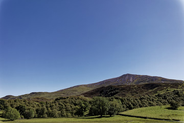 Fototapeta na wymiar Mountain view from Craigh Na Dun - Pitlochry, Scotland, United Kingdom