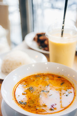 Tom yum soup ,Tom yam is a spicy clear soup typical in Thailand ,Thai Dish Cuisine.