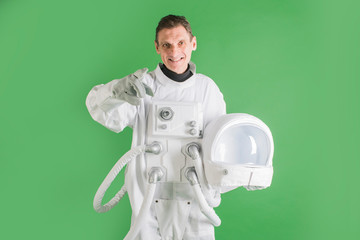 astronaut on a green background