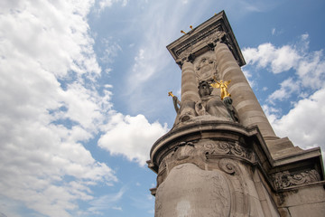 Fototapeta na wymiar Statue on bridge at Seine, Paris