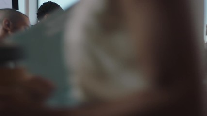 business woman team leader meeting with colleagues using computer pointing at screen office manager sharing ideas helping coworkers discussing strategy in corporate workplace