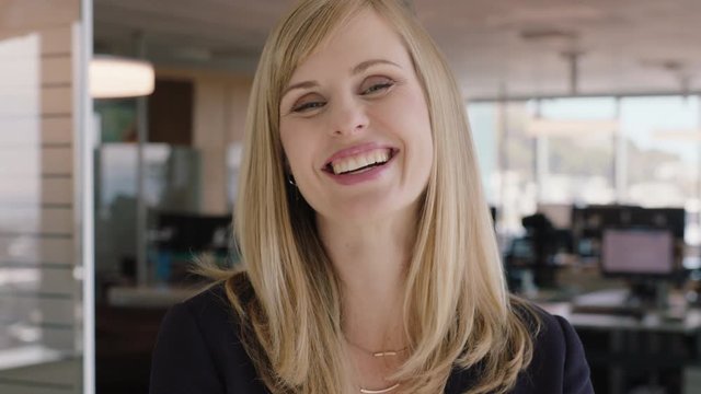 portrait successful blonde business woman laughing female office manager enjoying successful career in corporate management professional at work