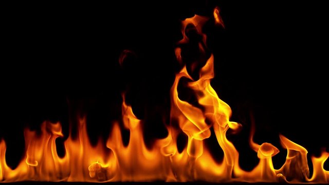 Super slow motion of fire line isolated on black background. Filmed on high speed cinema camera, 1000 fps