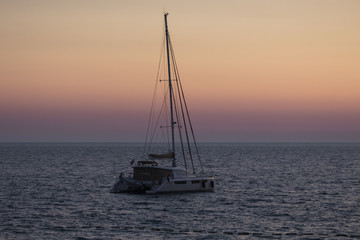 beautiful yacht on a background of sea sunset, concept of expensive luxury vacation.