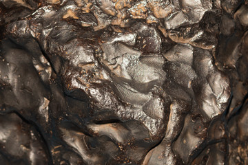 Meteorite texture background. meteorite surface close up