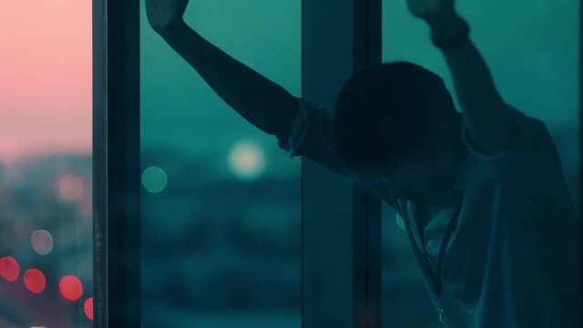 angry businessman looking out window stressed business executive feeling defeated after failure overworked office manager working late