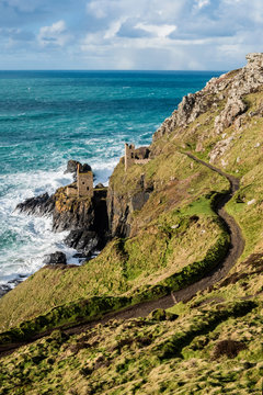 Scenic view of Botallack Mines against cloudy sky