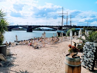 City beach (Rheinstrand) in Mainz-Kastel with theodor-heuss bridge in the background