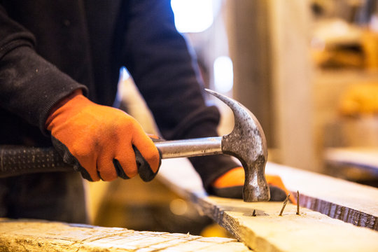 Midsection of worker working in warehouse