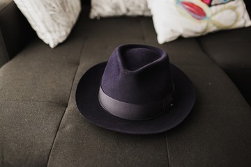 Elegant black hat of older man.