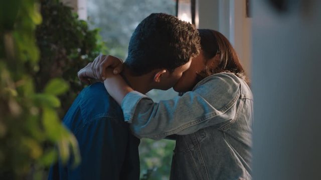 happy teen couple kiss teenage boy kissing girlfriend making out outside home enjoying romantic evening date 4k footage