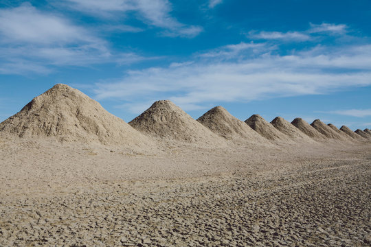 Heap of mining tailings in desert