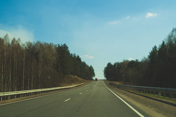 Car driving on a highway. auto moving on a roadway