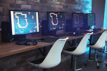 Internet cafe interior with modern computers. Video game tournament