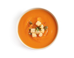 Bowl of tasty sweet potato soup isolated on white, top view