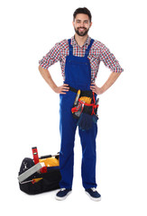 Full length portrait of construction worker with tools on white background