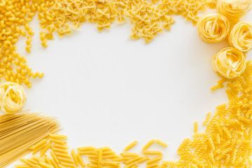 Italian pasta frame on white table background top view mock up