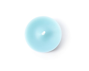 Small blue wax candle isolated on white, top view