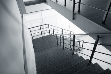 Stone stairs with metal railing indoors, view through CCTV camera
